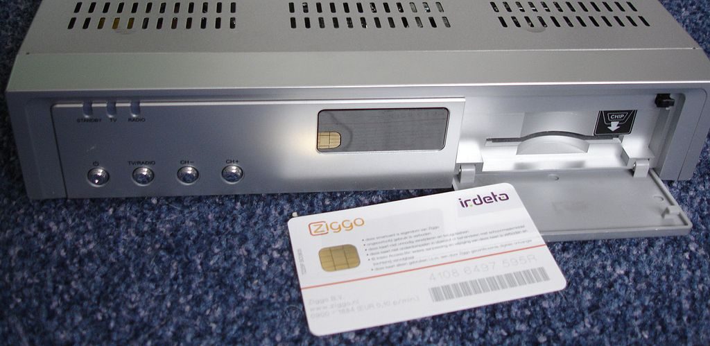 Irdeto smartcard in front of a Humax satellite decoder